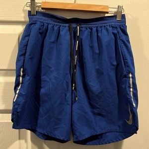Nike flex stride 7” running short size small game royal blue